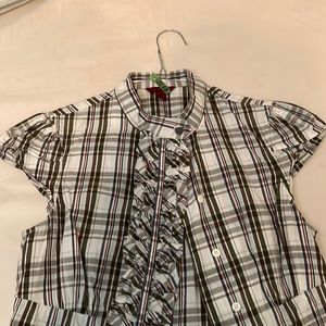 Ted baker cotton shirt with short gathered ruffled all the way down. Ted size 2